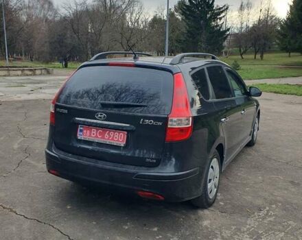 Чорний Хендай i30, об'ємом двигуна 1.4 л та пробігом 149 тис. км за 6100 $, фото 4 на Automoto.ua