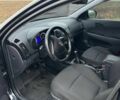 Черный Хендай i30, объемом двигателя 1.4 л и пробегом 190 тыс. км за 6700 $, фото 7 на Automoto.ua
