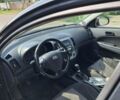 Черный Хендай i30, объемом двигателя 1.6 л и пробегом 320 тыс. км за 5600 $, фото 1 на Automoto.ua