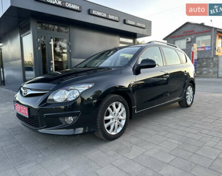 Черный Хендай i30, объемом двигателя 1.4 л и пробегом 162 тыс. км за 6450 $, фото 1 на Automoto.ua