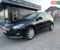 Черный Хендай i30, объемом двигателя 1.4 л и пробегом 162 тыс. км за 6450 $, фото 1 на Automoto.ua