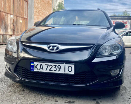 Черный Хендай i30, объемом двигателя 1.4 л и пробегом 215 тыс. км за 5900 $, фото 1 на Automoto.ua