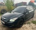 Черный Хендай i30, объемом двигателя 1.58 л и пробегом 258 тыс. км за 4950 $, фото 1 на Automoto.ua
