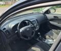 Черный Хендай i30, объемом двигателя 1.6 л и пробегом 320 тыс. км за 5800 $, фото 1 на Automoto.ua