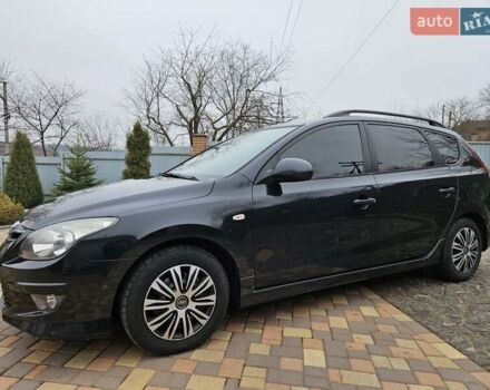Черный Хендай i30, объемом двигателя 1.4 л и пробегом 154 тыс. км за 6700 $, фото 5 на Automoto.ua