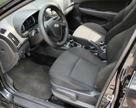 Чорний Хендай i30, об'ємом двигуна 1.4 л та пробігом 176 тис. км за 5700 $, фото 7 на Automoto.ua