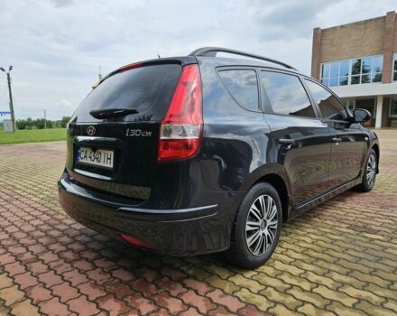 Черный Хендай i30, объемом двигателя 1.4 л и пробегом 157 тыс. км за 6700 $, фото 4 на Automoto.ua