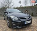 Черный Хендай i30, объемом двигателя 1.4 л и пробегом 154 тыс. км за 6700 $, фото 1 на Automoto.ua