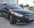 Черный Хендай i30, объемом двигателя 1.59 л и пробегом 245 тыс. км за 6990 $, фото 1 на Automoto.ua