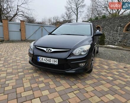 Черный Хендай i30, объемом двигателя 1.4 л и пробегом 154 тыс. км за 6700 $, фото 3 на Automoto.ua