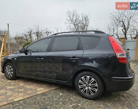 Черный Хендай i30, объемом двигателя 1.4 л и пробегом 154 тыс. км за 6700 $, фото 6 на Automoto.ua