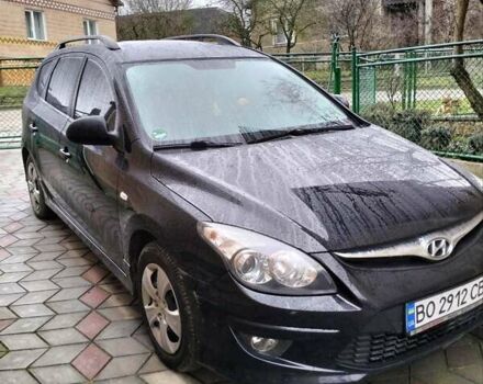 Черный Хендай i30, объемом двигателя 1.4 л и пробегом 157 тыс. км за 7100 $, фото 3 на Automoto.ua