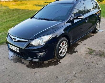 Чорний Хендай i30, об'ємом двигуна 1.6 л та пробігом 256 тис. км за 6500 $, фото 6 на Automoto.ua