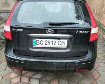 Черный Хендай i30, объемом двигателя 1.4 л и пробегом 157 тыс. км за 7100 $, фото 7 на Automoto.ua