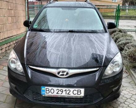 Черный Хендай i30, объемом двигателя 1.4 л и пробегом 157 тыс. км за 7100 $, фото 1 на Automoto.ua