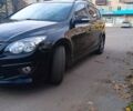 Черный Хендай i30, объемом двигателя 1.4 л и пробегом 224 тыс. км за 7500 $, фото 1 на Automoto.ua