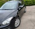Черный Хендай i30, объемом двигателя 1.4 л и пробегом 137 тыс. км за 7500 $, фото 8 на Automoto.ua