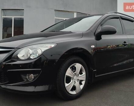 Черный Хендай i30, объемом двигателя 1.59 л и пробегом 72 тыс. км за 8500 $, фото 1 на Automoto.ua