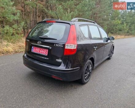 Черный Хендай i30, объемом двигателя 1.6 л и пробегом 232 тыс. км за 7000 $, фото 6 на Automoto.ua