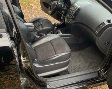 Черный Хендай i30, объемом двигателя 1.58 л и пробегом 235 тыс. км за 6700 $, фото 9 на Automoto.ua