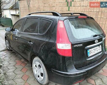 Черный Хендай i30, объемом двигателя 1.4 л и пробегом 157 тыс. км за 7100 $, фото 6 на Automoto.ua