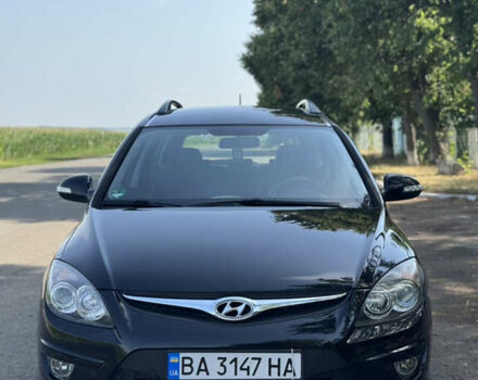Черный Хендай i30, объемом двигателя 1.58 л и пробегом 241 тыс. км за 6999 $, фото 1 на Automoto.ua