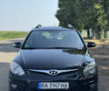 Черный Хендай i30, объемом двигателя 1.58 л и пробегом 241 тыс. км за 6999 $, фото 1 на Automoto.ua