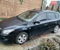 Черный Хендай i30, объемом двигателя 1.4 л и пробегом 157 тыс. км за 7100 $, фото 1 на Automoto.ua
