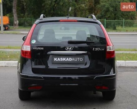 Чорний Хендай i30, об'ємом двигуна 1.59 л та пробігом 177 тис. км за 8300 $, фото 4 на Automoto.ua