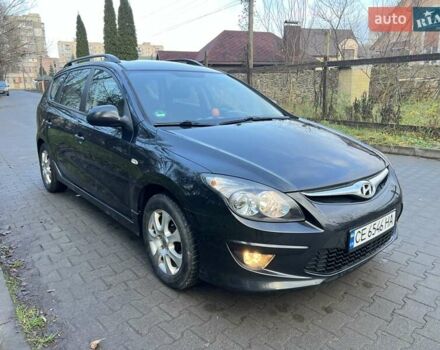 Черный Хендай i30, объемом двигателя 1.4 л и пробегом 187 тыс. км за 5550 $, фото 1 на Automoto.ua