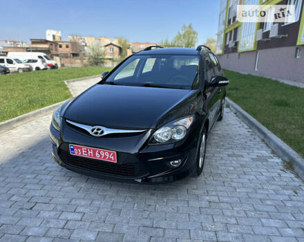 Черный Хендай i30, объемом двигателя 1.6 л и пробегом 105 тыс. км за 9500 $, фото 1 на Automoto.ua