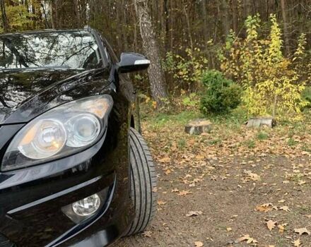 Черный Хендай i30, объемом двигателя 1.58 л и пробегом 235 тыс. км за 6700 $, фото 2 на Automoto.ua