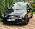 Чорний Хендай i30, об'ємом двигуна 1.6 л та пробігом 202 тис. км за 8399 $, фото 1 на Automoto.ua