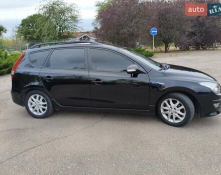 Черный Хендай i30, объемом двигателя 1.4 л и пробегом 137 тыс. км за 7500 $, фото 7 на Automoto.ua