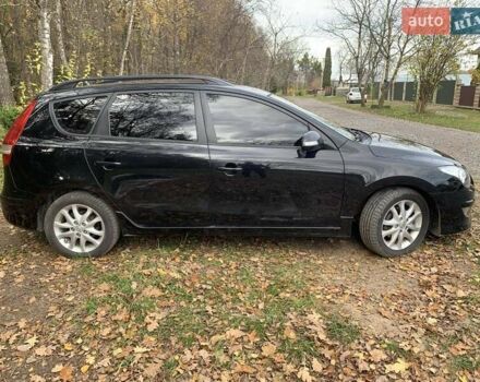 Черный Хендай i30, объемом двигателя 1.58 л и пробегом 235 тыс. км за 6700 $, фото 3 на Automoto.ua