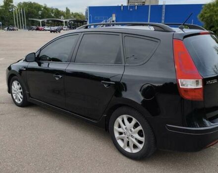 Черный Хендай i30, объемом двигателя 1.4 л и пробегом 137 тыс. км за 7500 $, фото 3 на Automoto.ua