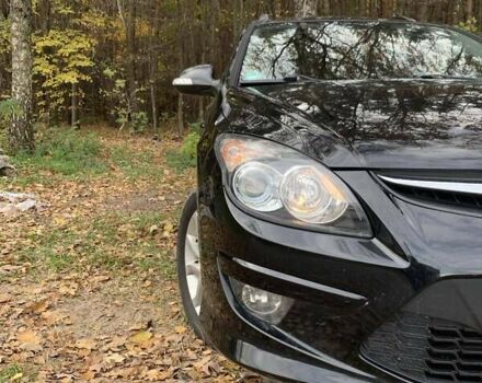 Черный Хендай i30, объемом двигателя 1.58 л и пробегом 235 тыс. км за 6700 $, фото 1 на Automoto.ua