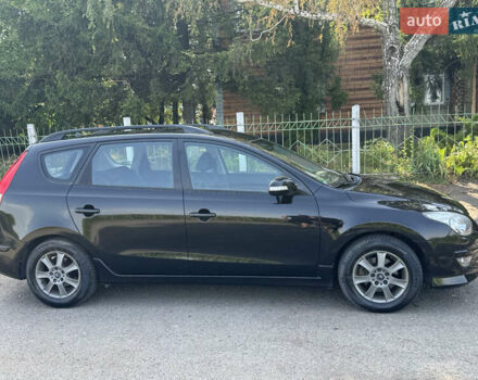 Черный Хендай i30, объемом двигателя 1.58 л и пробегом 241 тыс. км за 6999 $, фото 3 на Automoto.ua