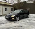 Чорний Хендай i30, об'ємом двигуна 1.4 л та пробігом 234 тис. км за 6490 $, фото 1 на Automoto.ua