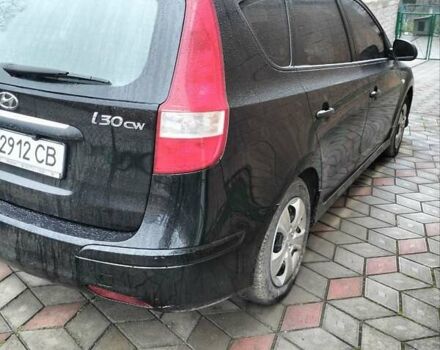 Черный Хендай i30, объемом двигателя 1.4 л и пробегом 157 тыс. км за 7100 $, фото 5 на Automoto.ua