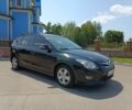 Черный Хендай i30, объемом двигателя 1.4 л и пробегом 190 тыс. км за 5750 $, фото 1 на Automoto.ua