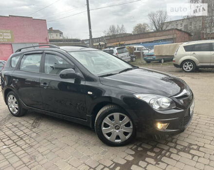 Черный Хендай i30, объемом двигателя 1.58 л и пробегом 175 тыс. км за 7500 $, фото 4 на Automoto.ua