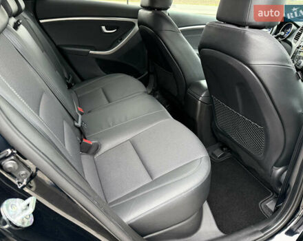 Чорний Хендай i30, об'ємом двигуна 1.6 л та пробігом 202 тис. км за 12500 $, фото 20 на Automoto.ua