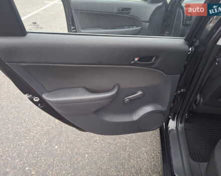 Чорний Хендай i30, об'ємом двигуна 1.4 л та пробігом 209 тис. км за 6850 $, фото 19 на Automoto.ua