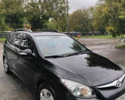 Черный Хендай i30, объемом двигателя 1.58 л и пробегом 210 тыс. км за 7500 $, фото 3 на Automoto.ua