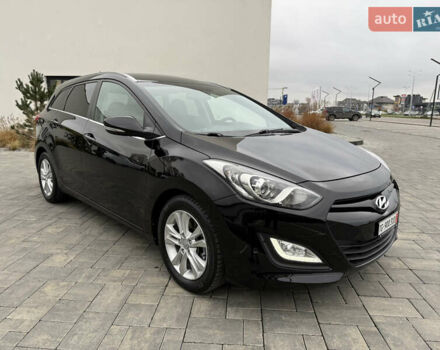 Чорний Хендай i30, об'ємом двигуна 1.6 л та пробігом 202 тис. км за 12500 $, фото 11 на Automoto.ua