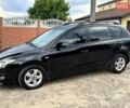 Черный Хендай i30, объемом двигателя 1.6 л и пробегом 209 тыс. км за 7300 $, фото 1 на Automoto.ua
