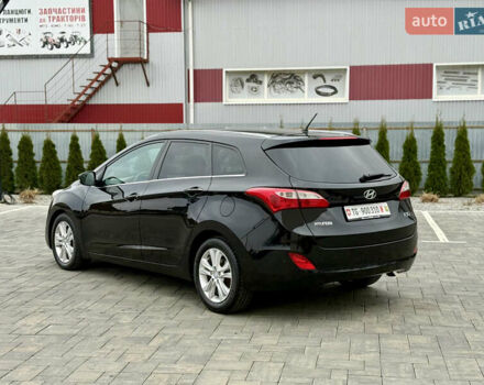 Чорний Хендай i30, об'ємом двигуна 1.6 л та пробігом 202 тис. км за 12500 $, фото 4 на Automoto.ua
