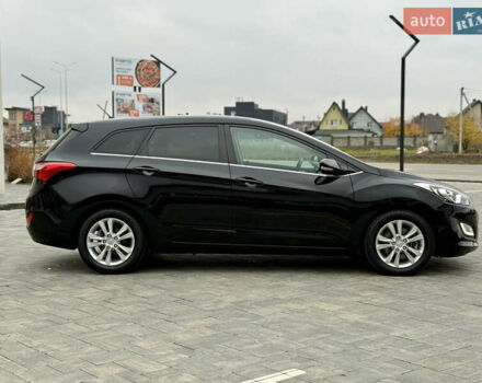 Чорний Хендай i30, об'ємом двигуна 1.6 л та пробігом 202 тис. км за 12500 $, фото 1 на Automoto.ua