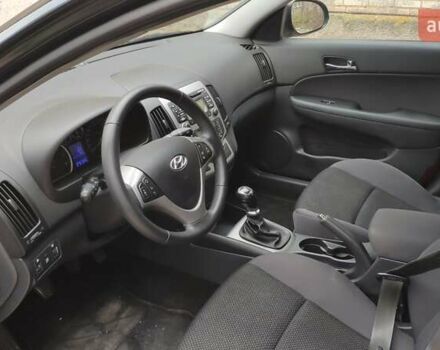 Черный Хендай i30, объемом двигателя 1.4 л и пробегом 275 тыс. км за 6000 $, фото 22 на Automoto.ua